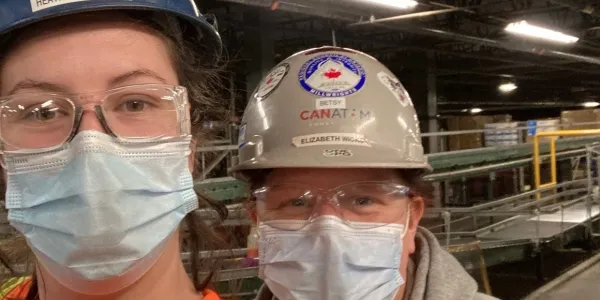 Two SIB Workers in Masks